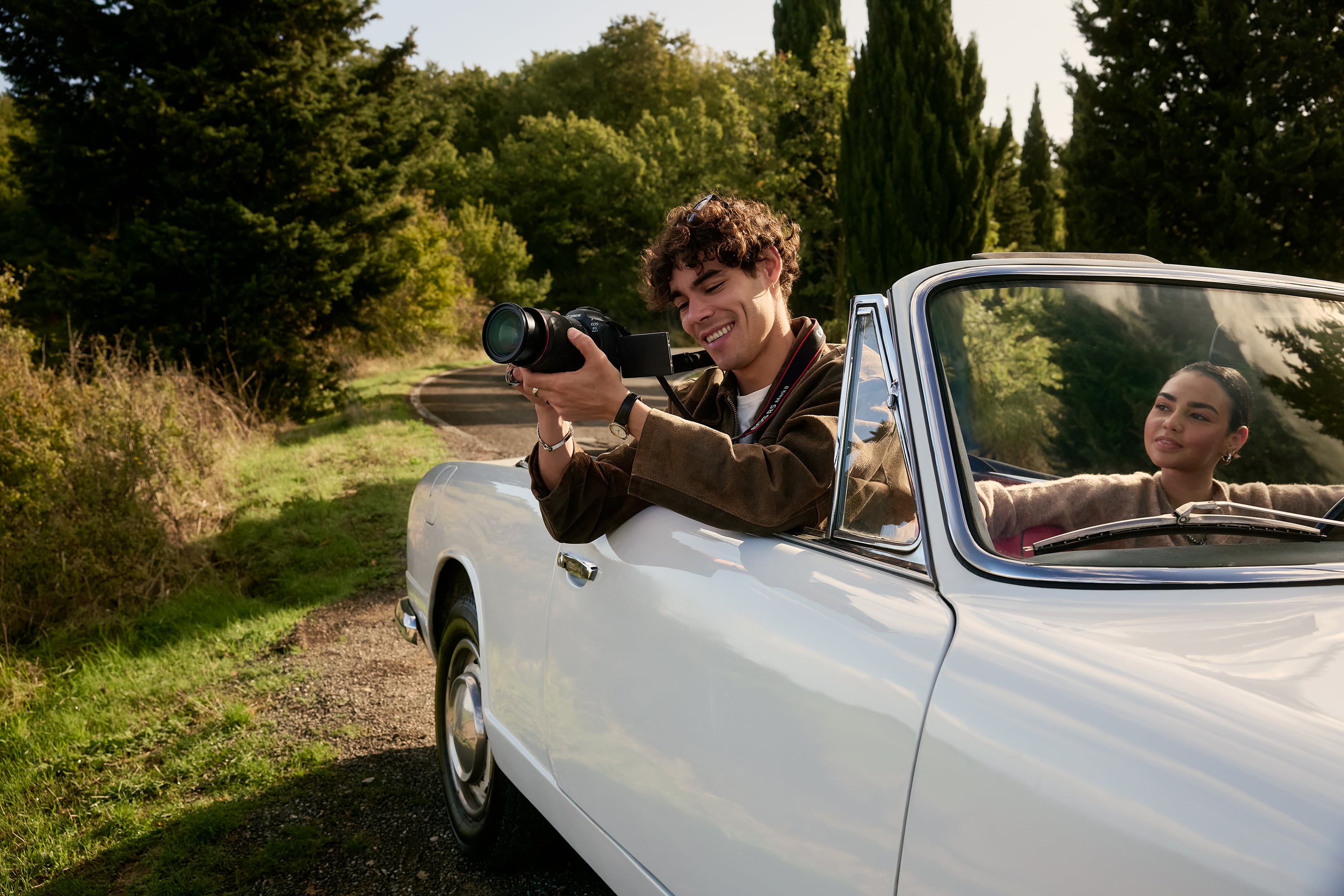 Two People in a Car Taking a Picture